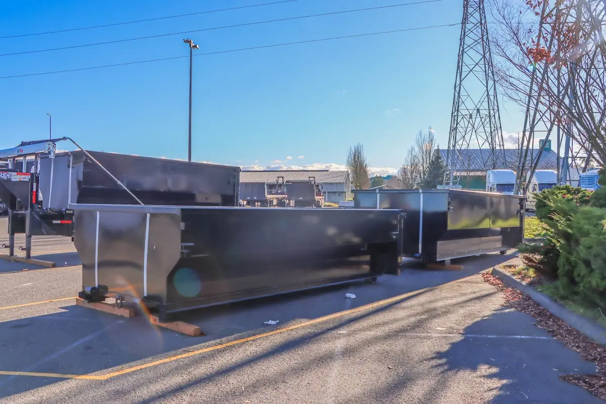 Roll-off dumpster ready for waste disposal at job site for Demolition Dumpster Rental in Scriba